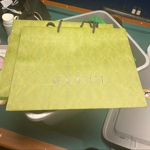 2 Gucci shopping bags